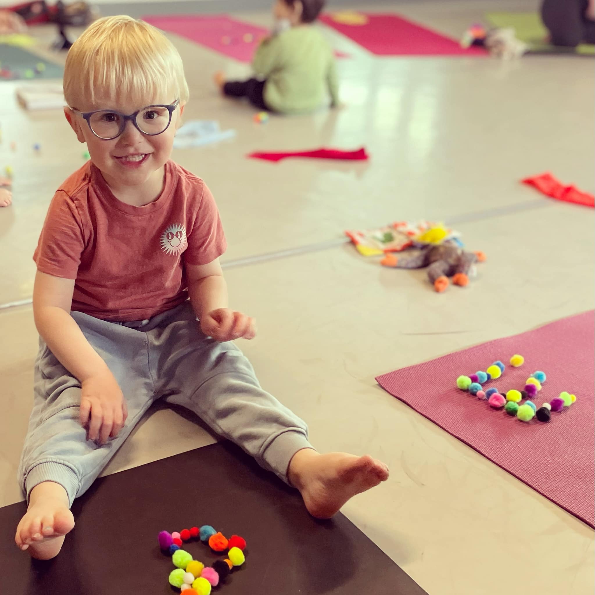 yoga kid doing a craft