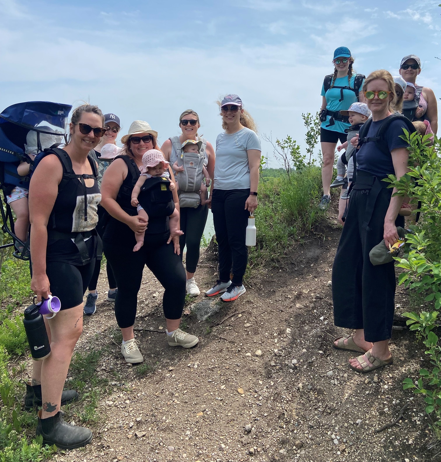 parent and baby hiking